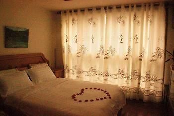 Yangguang Xingzuo Apartment Hotel Chongqing Zewnętrze zdjęcie